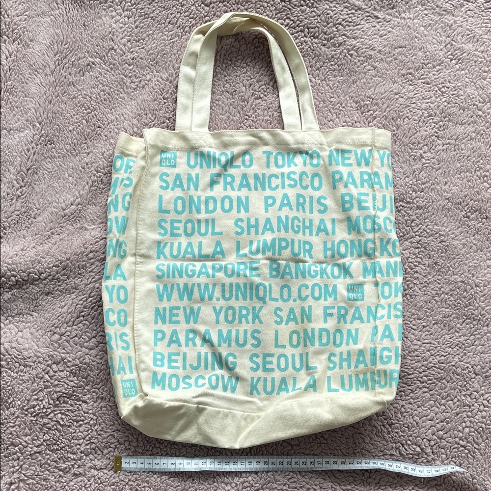 Uniqlo Cream Canvas Tote with Light Blue City Text Print